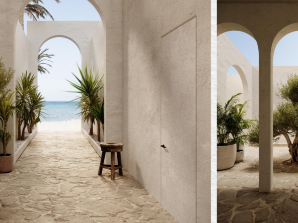 Interior courtyard at Ogami Ras El Hekma framed by arches and lush greenery